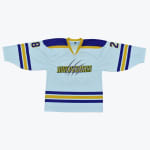 A white hockey jersey with WOLVERINES written across the chest in yellow and purple, featuring claw marks, purple and gold stripes on the sleeves and hem, and the number 82 split on the shoulders.