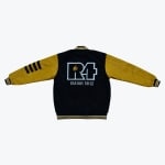 Back of a black and gold varsity jacket featuring a large embroidered R4 logo with a flame and cross, and the text ISAIAH 58:12 below it.