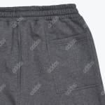 Close-up of the back pocket and waistband of dark grey Addos sweat shorts.