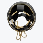 Top-down view of a black leather boxing headgear with gold laces and trim on a white background.