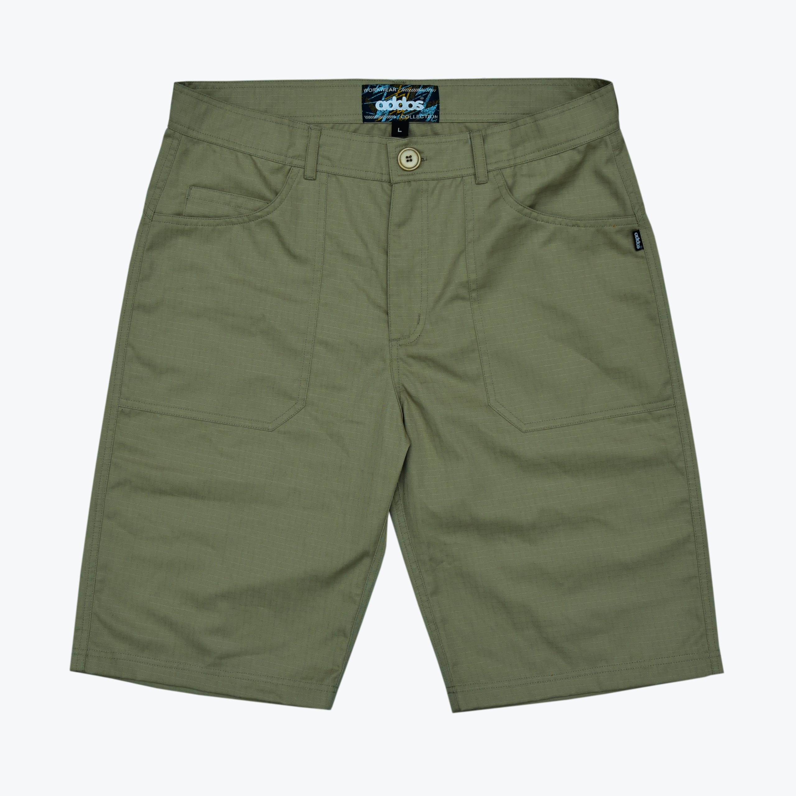 Olive Green Utility Shorts A pair of olive green utility shorts with large front patch pockets and a button waist, laid flat on a white background.
