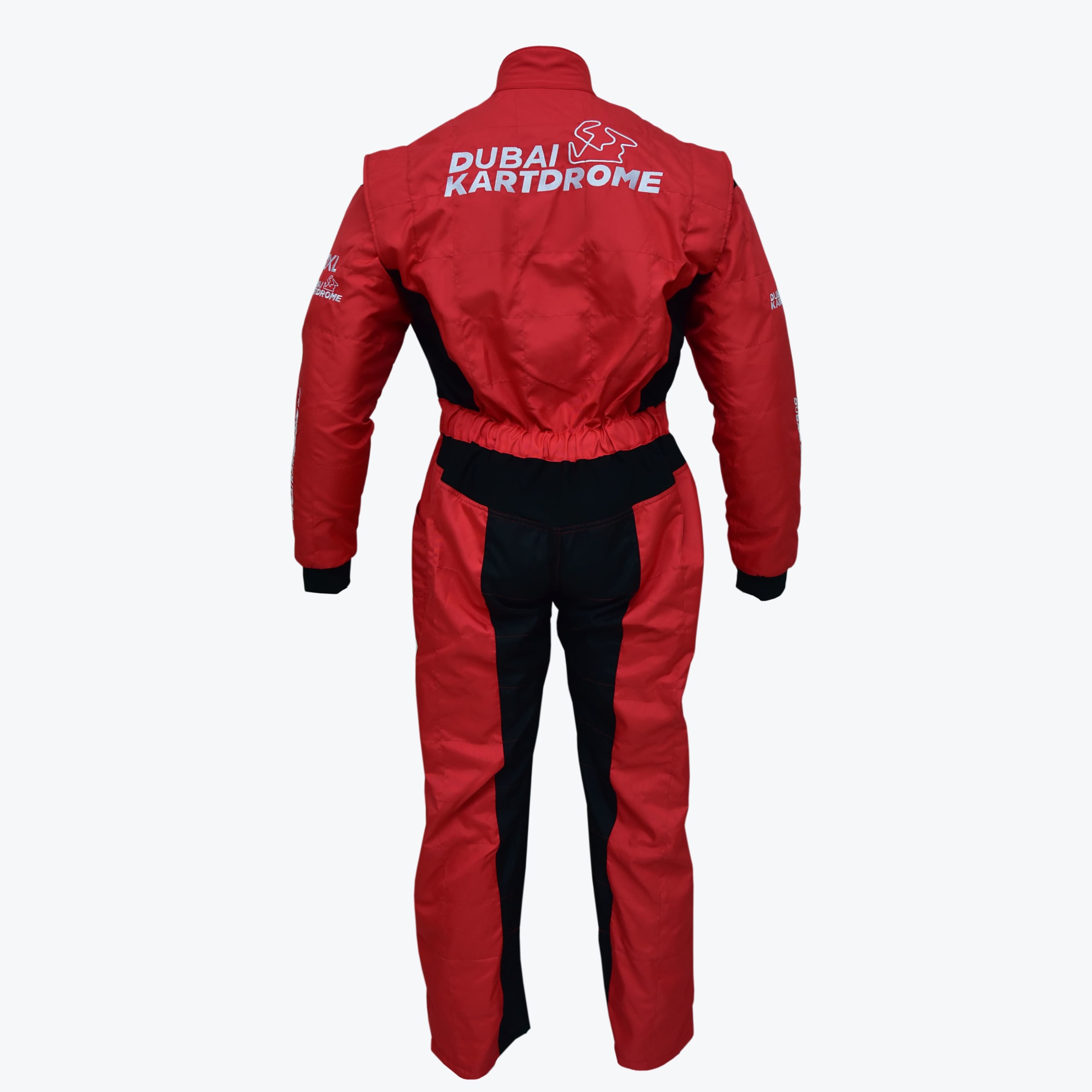 Back view of a red and black racing suit with Dubai Kartdrome printed in white on the upper back, set against a plain white background.