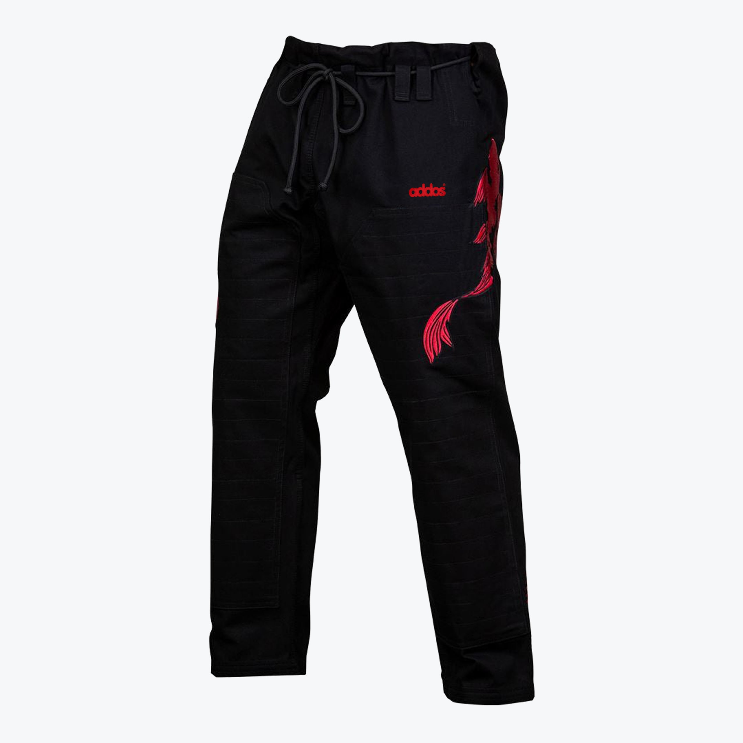 Black Addos martial arts gi pants with a red drawstring, red Addos logo, and a large red koi fish embroidery on the left leg.