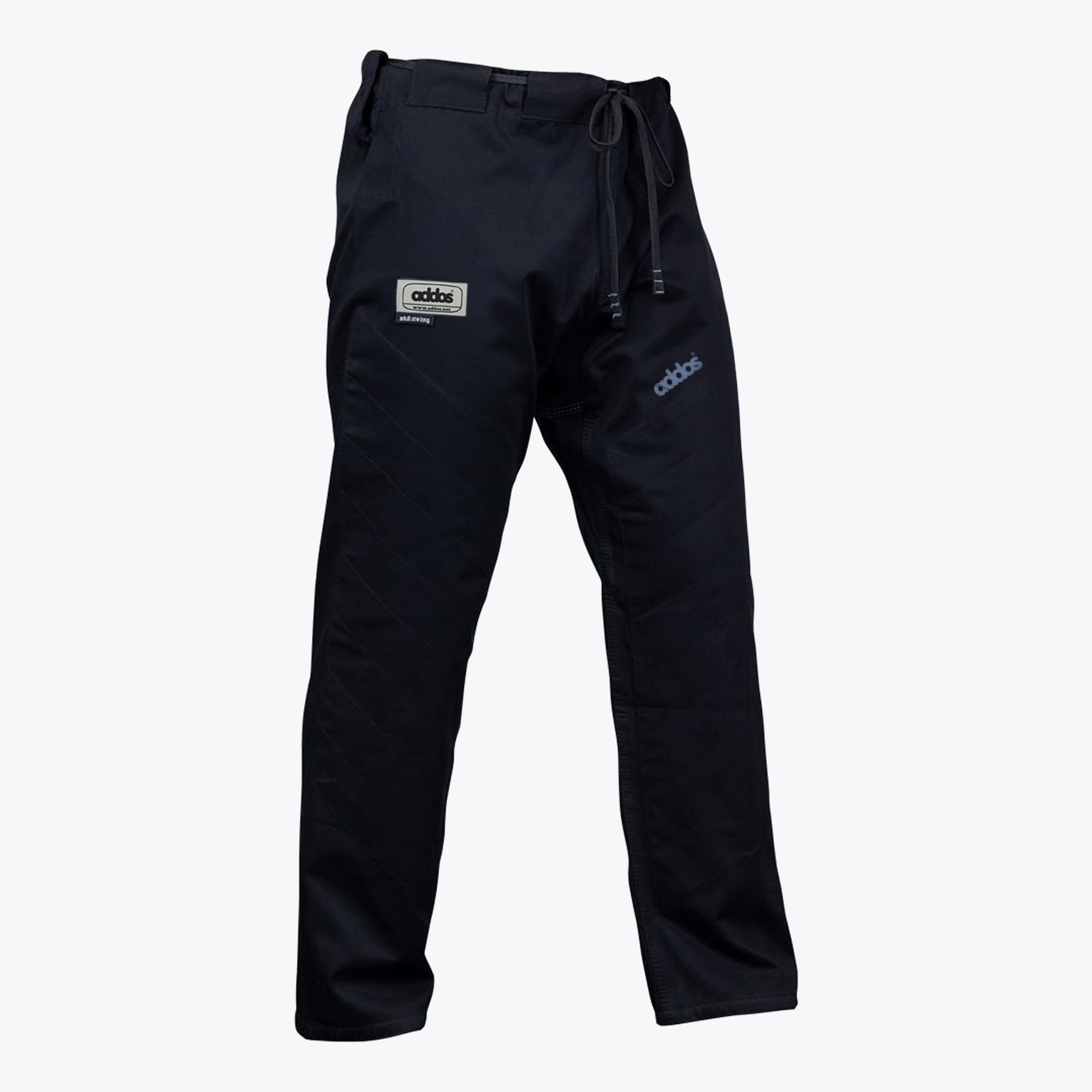 A pair of black martial arts gi pants with a drawstring waist and brand logos on both thighs, isolated on a white background.