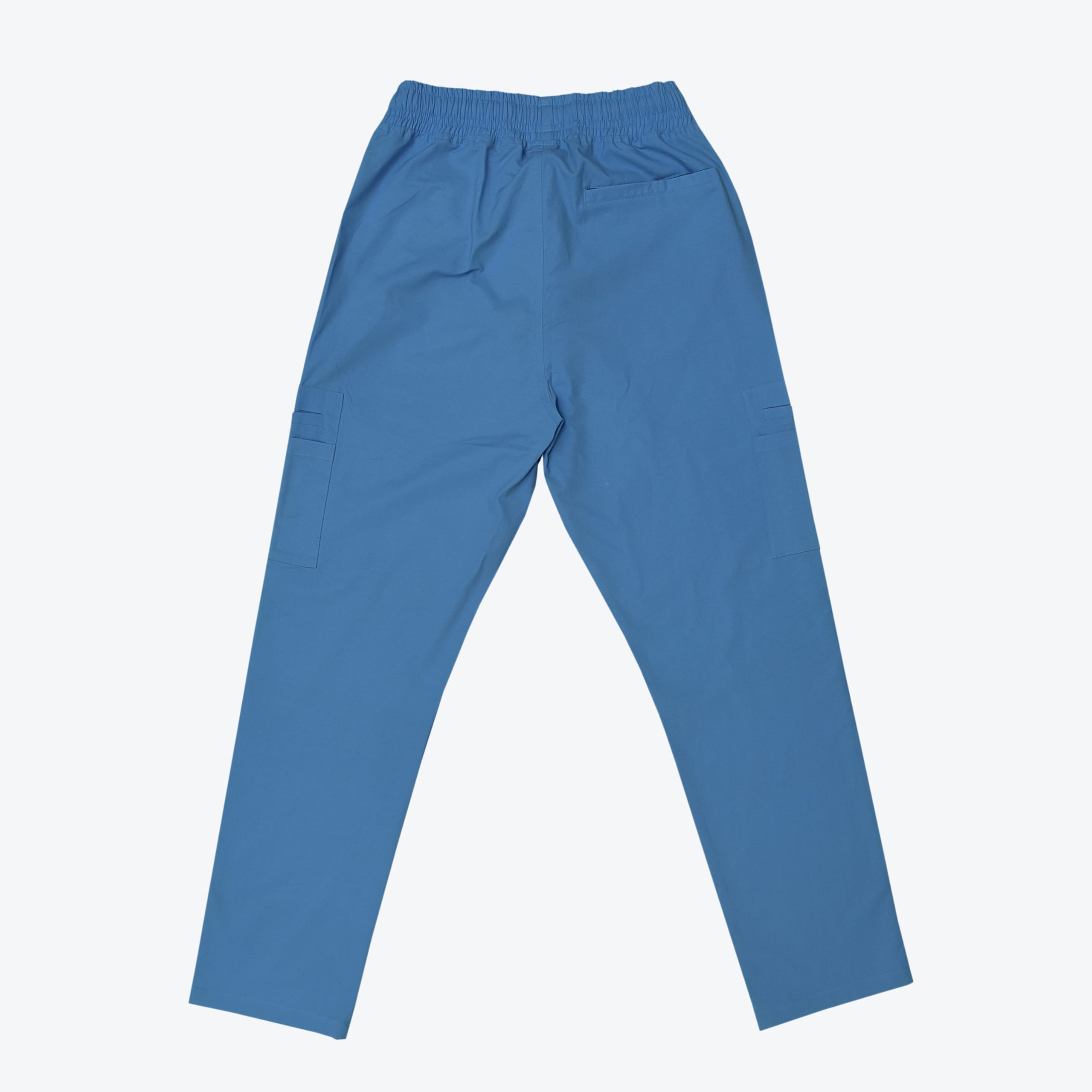 Back view of blue cargo scrub pants with an elastic waist and side pockets on a white background.