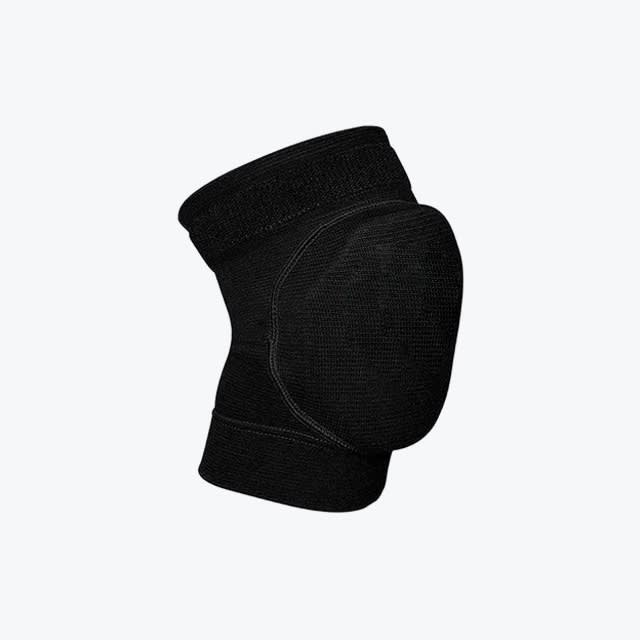 A side-angle view of a single black padded knee pad isolated on a white background.