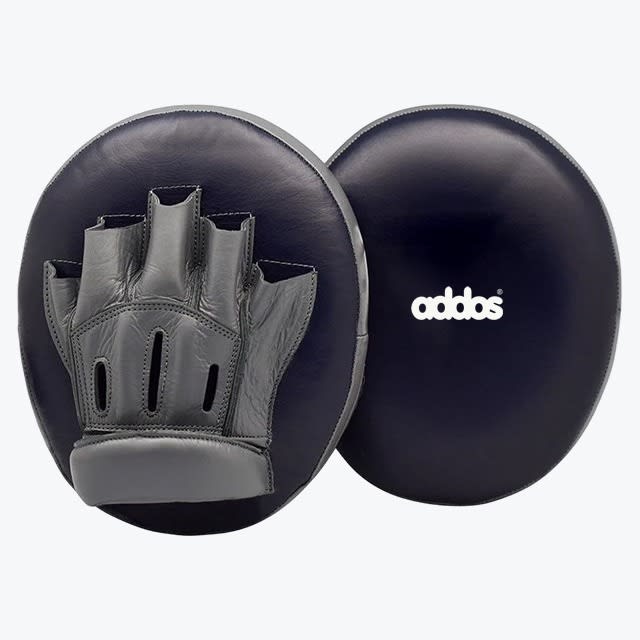 A pair of dark blue Addos focus mitts against a white background, showing the front striking surface with the brand logo and the back side with a grey hand compartment.