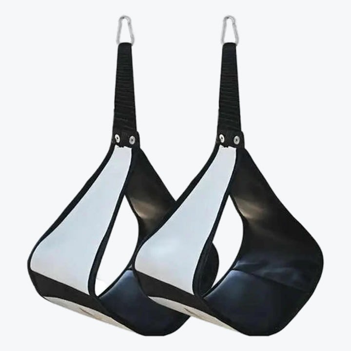 A pair of black and white padded hanging ab straps with metal carabiners on a plain white background.