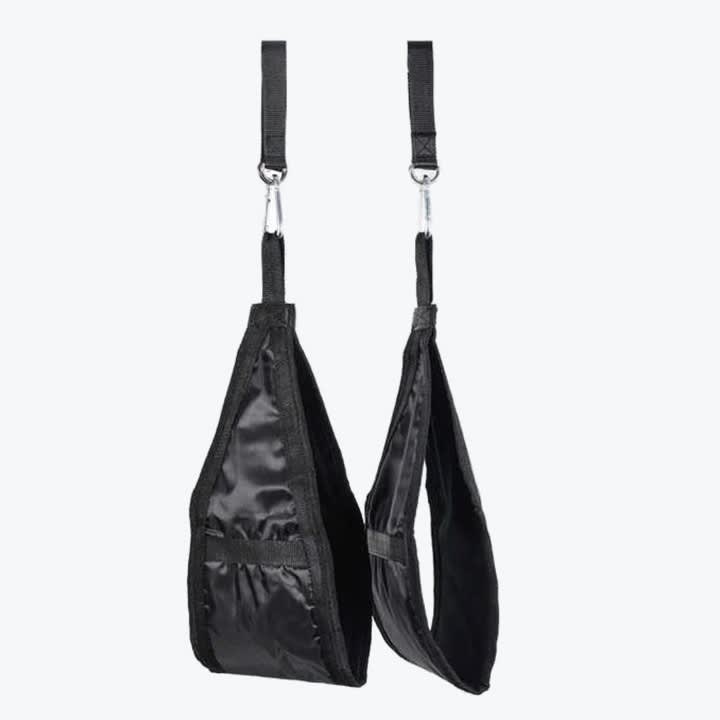 A pair of black padded ab straps with metal carabiners hanging vertically against a white background.