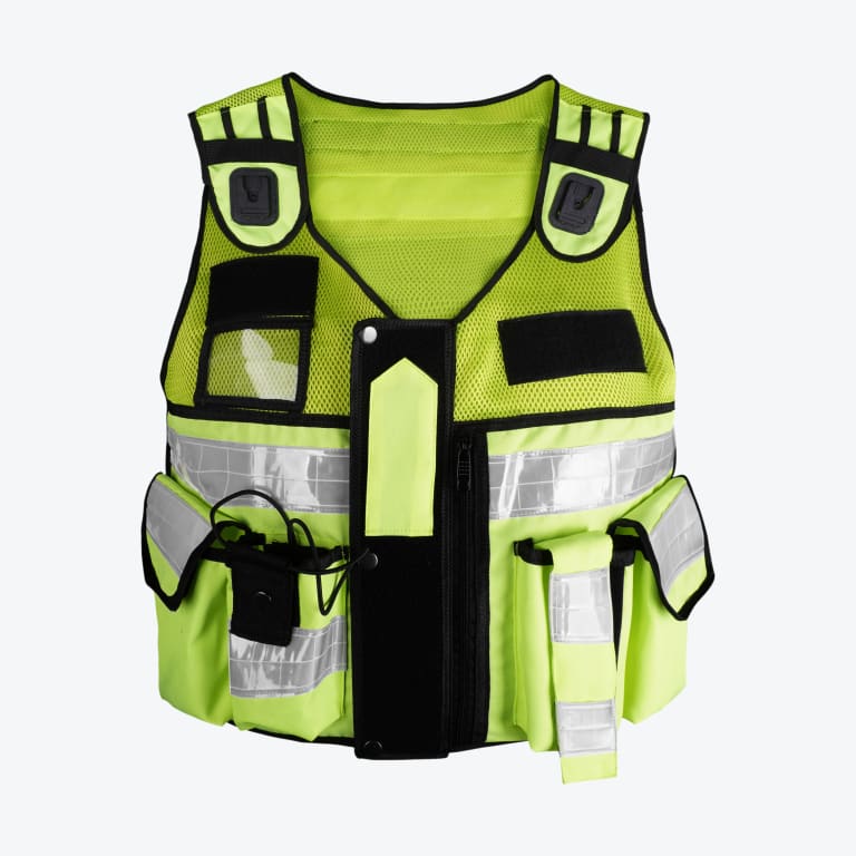 A neon yellow high-visibility safety vest with reflective silver strips, multiple pockets, and black trim, isolated on a white background.