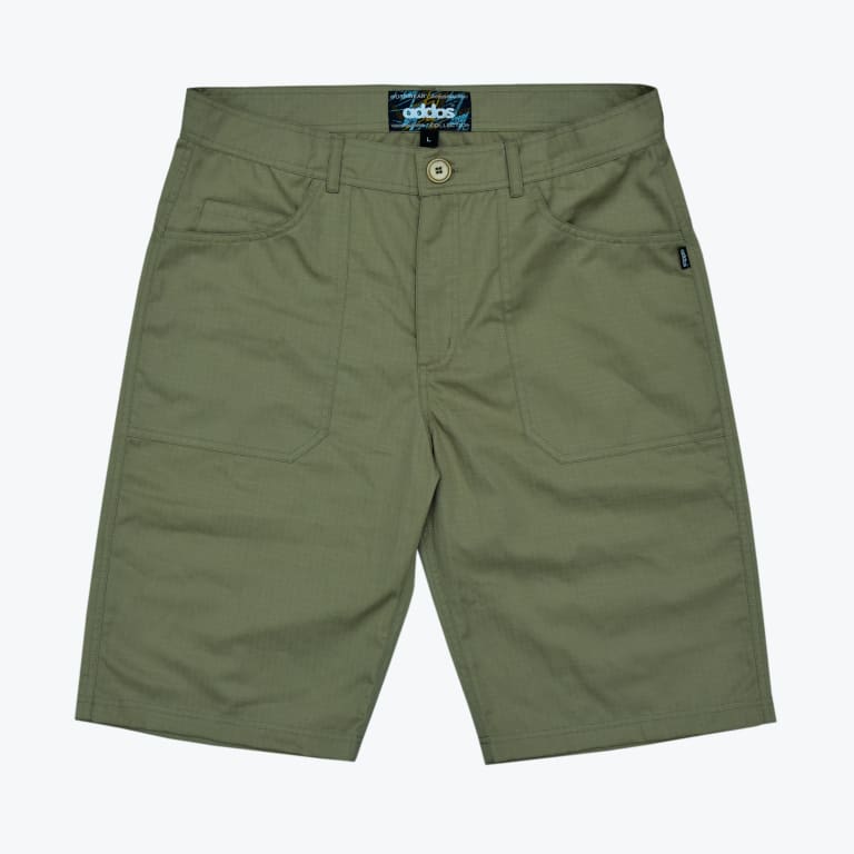 A pair of olive green utility shorts with large front patch pockets and a button waist, laid flat on a white background.