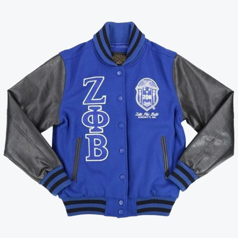 A royal blue and black varsity jacket featuring the Greek letters ZΑB and the Zeta Phi Beta Sorority crest.