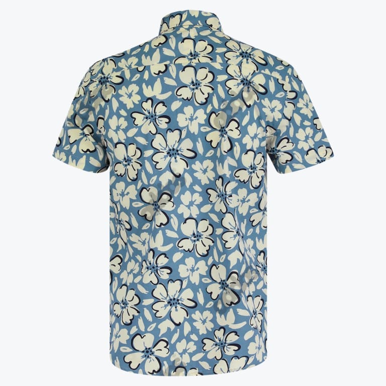 Back view of a blue short-sleeved shirt with a cream-colored floral pattern.