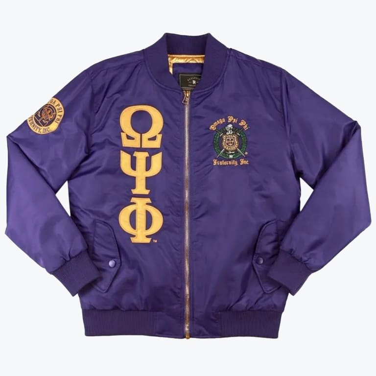 A purple bomber jacket with gold Greek letters Omega Psi Phi on the right chest and the fraternity crest on the left chest.