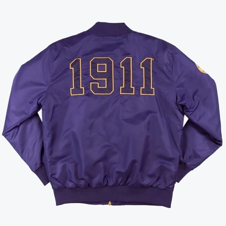 Back view of a purple bomber jacket with '1911' written in large gold-outlined block numbers across the upper back.