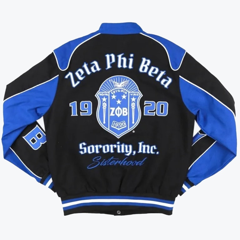 The back of a black and royal blue varsity jacket featuring the Zeta Phi Beta Sorority crest, the text Zeta Phi Beta Sorority, Inc the founding year Sisterhood in blue script.
