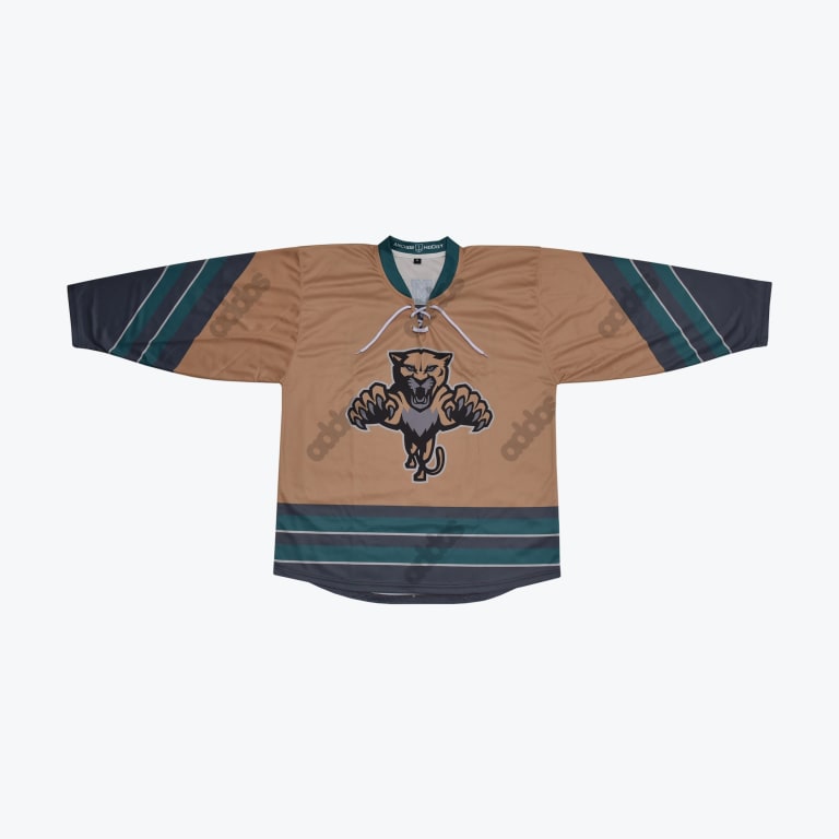 A tan hockey jersey with a leaping panther logo on the chest and teal and grey stripes on the sleeves and hem.