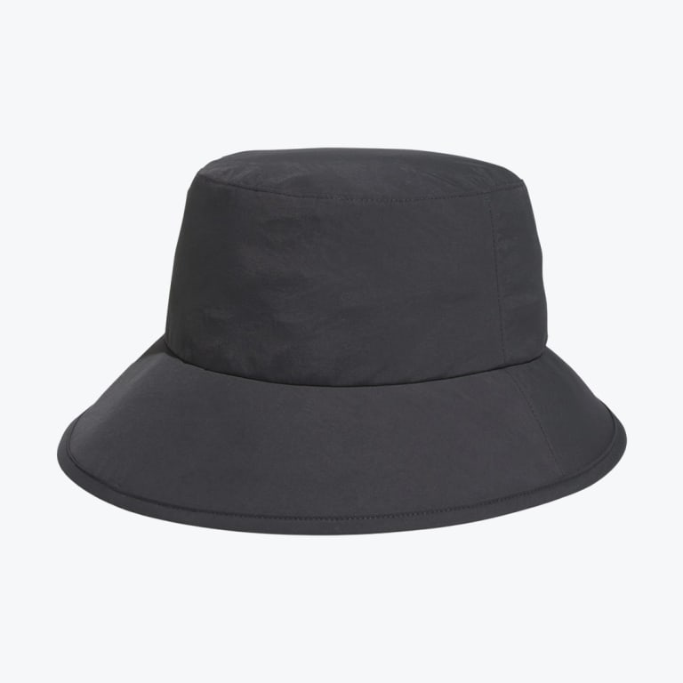 A dark grey wide-brim bucket hat on a white background.