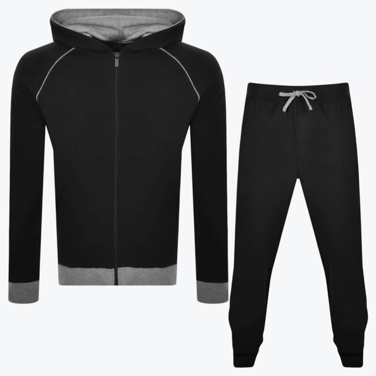 A black and grey mens tracksuit set consisting of a zip-up hoodie and matching jogger pants displayed on a white background.