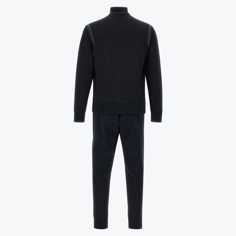 Back view of a solid black mens tracksuit consisting of a high-collar jacket and slim-fit sweatpants on a white background.