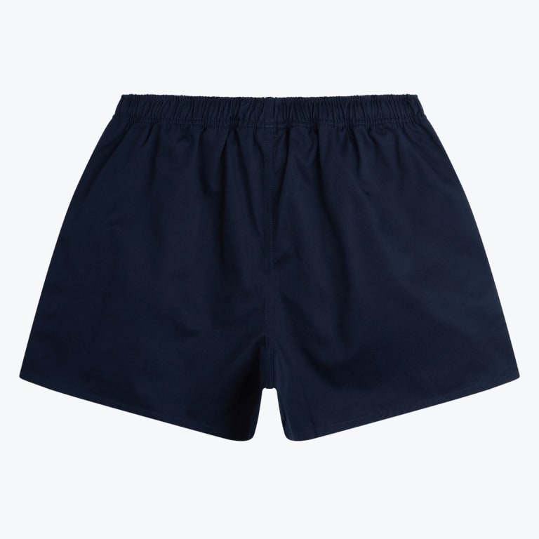 A pair of solid navy blue shorts with an elastic waistband, shown from the back against a white background.