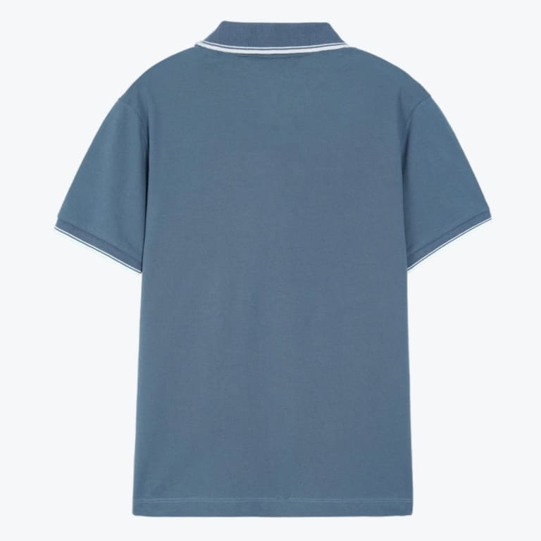 The back view of a slate blue short-sleeved polo shirt with white tipping on the collar and cuffs, displayed on a white background.