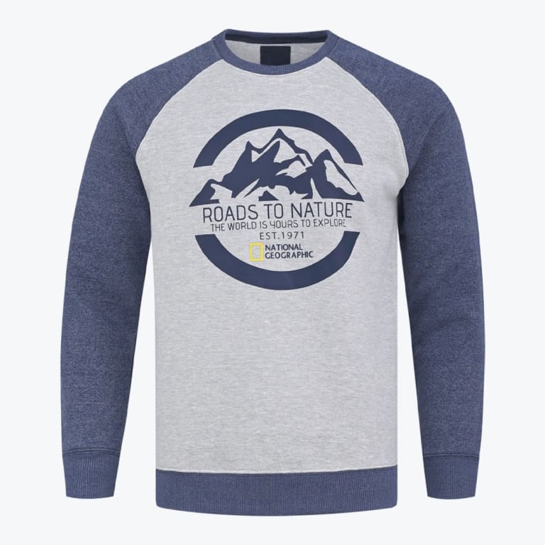 A grey and blue raglan sweatshirt with a National Geographic Roads to Nature mountain graphic on the front.