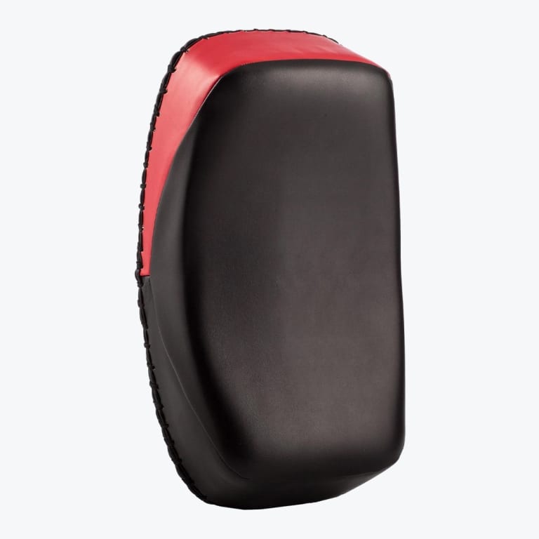 A black and red curved martial arts kick pad on a solid white background.