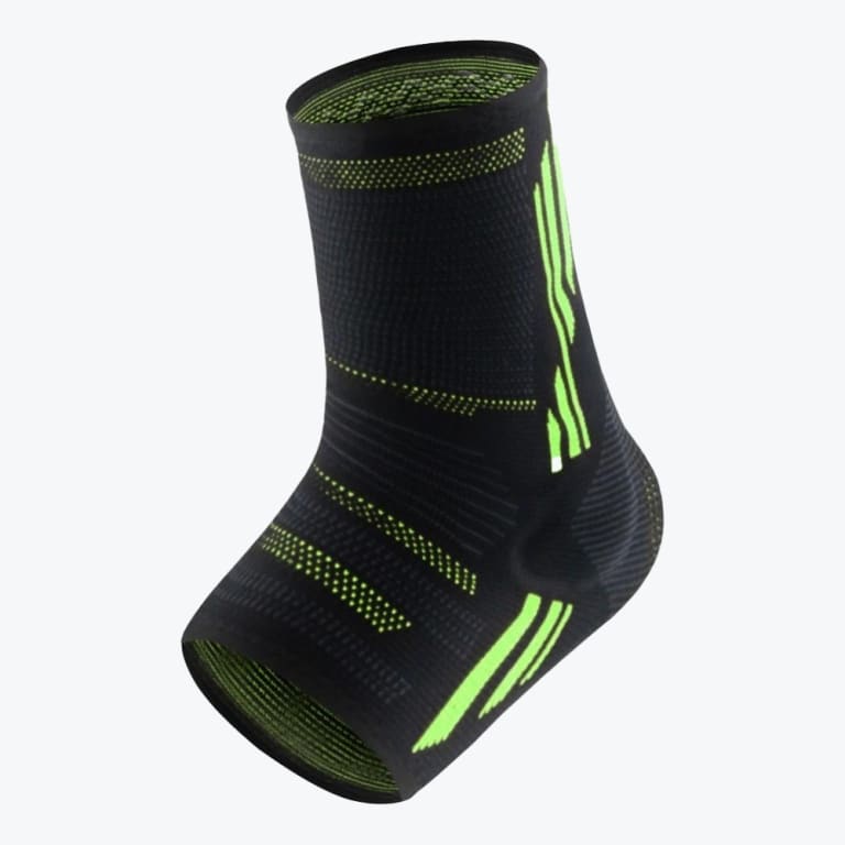 A black and neon green compression ankle sleeve shown at an angle against a white background.