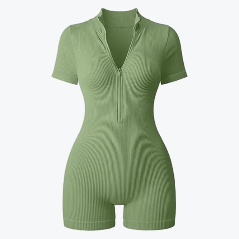 A form-fitting sage green ribbed knit short-sleeve romper with a front zipper on a white background.