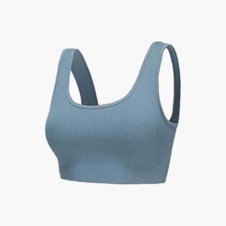 A dusty blue ribbed seamless sports bra with a scoop neck and wide straps, isolated on a plain white background.