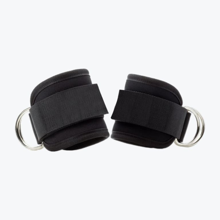 A pair of black padded ankle straps with adjustable Velcro bands and silver metal D-rings, set against a plain white background.