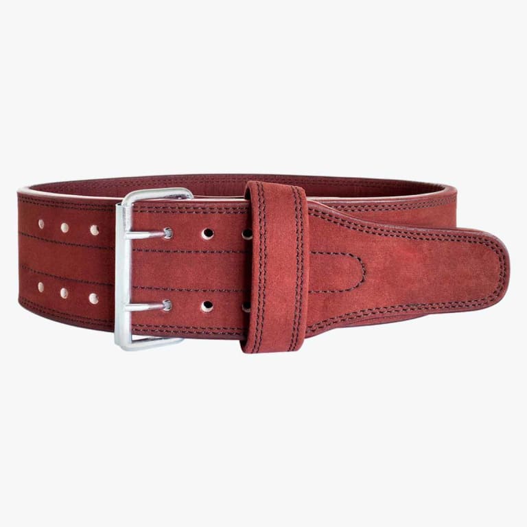 A thick burgundy suede weightlifting belt with a double-prong silver buckle, shown buckled on a white background.