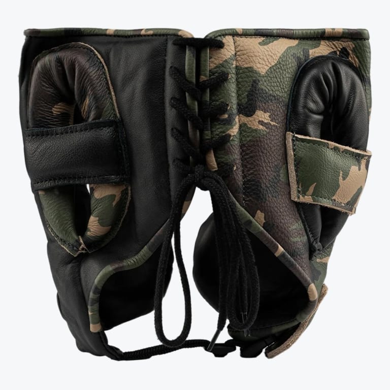 Rear view of a boxing headguard featuring a split design of black leather and camouflage pattern, secured with black laces at the back.