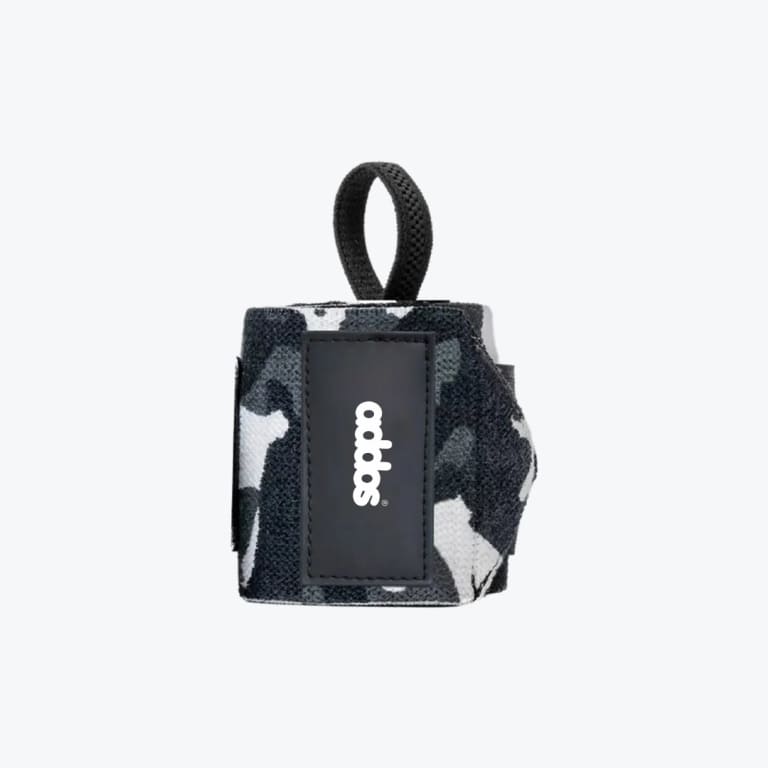 A rolled-up Addos wrist wrap with a black, grey, and white camouflage pattern, featuring a black patch with the white Addos logo and a black thumb loop on a white background.