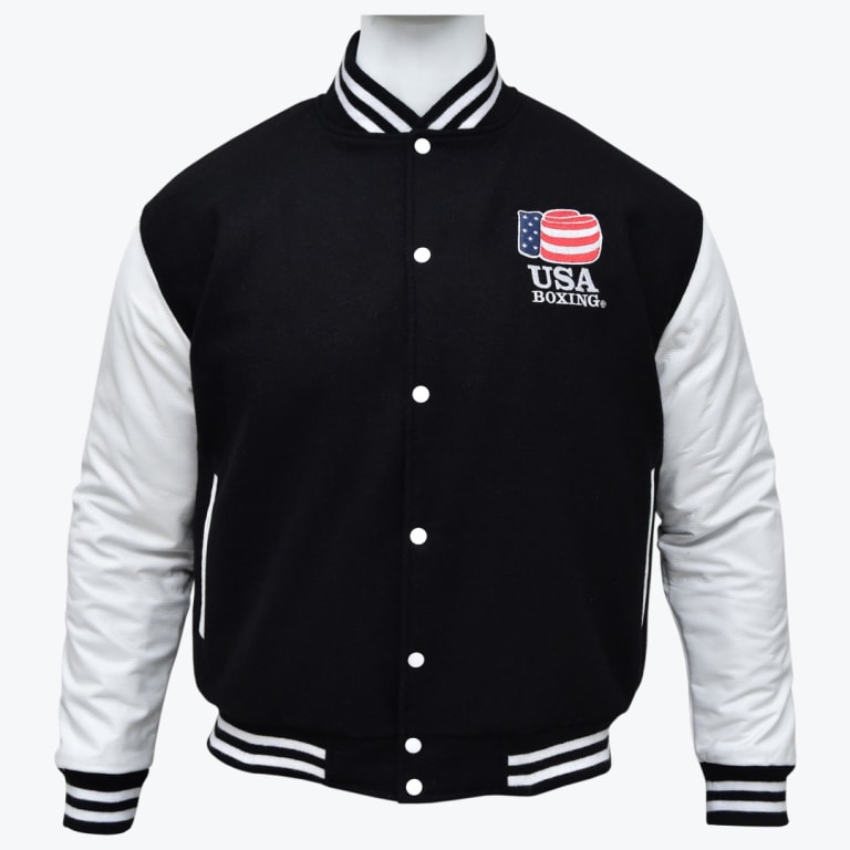 A black and white varsity jacket with USA Boxing embroidered on the left chest, displayed on a mannequin against a white background.