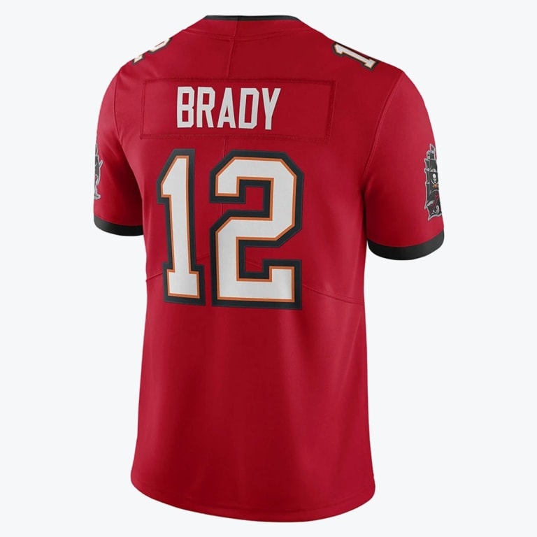 The back of a red Tom Brady Tampa Bay Buccaneers jersey with the name BRADY and number 12.