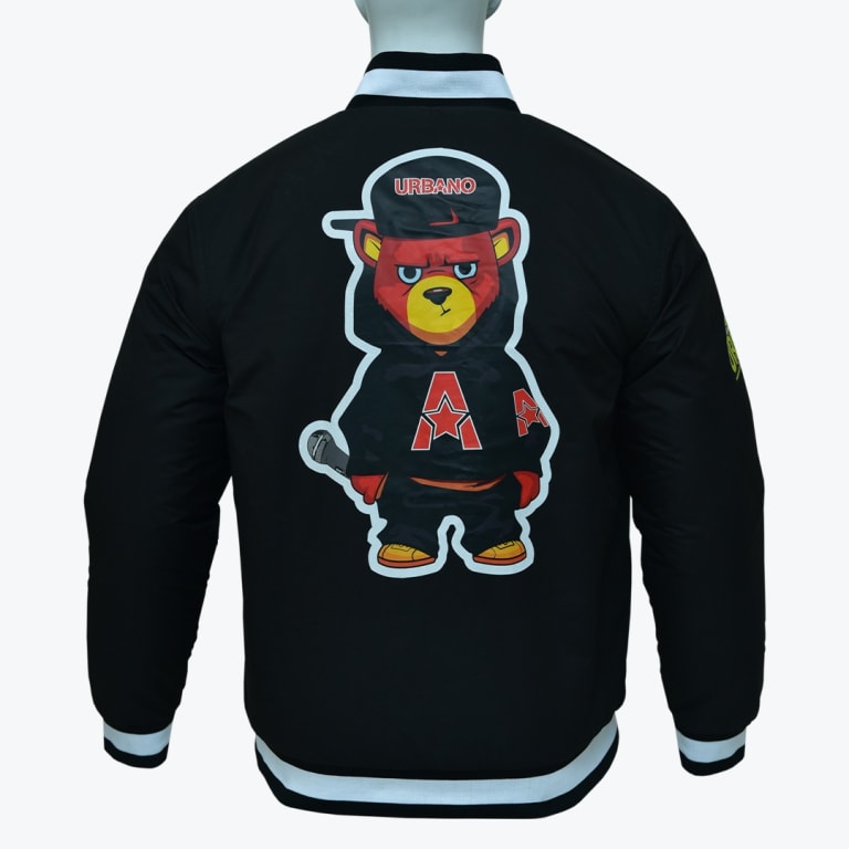 Back view of a black bomber jacket on a mannequin, featuring a large graphic of an angry cartoon bear wearing a cap labeled URBANO and a black hoodie with a red star logo.
