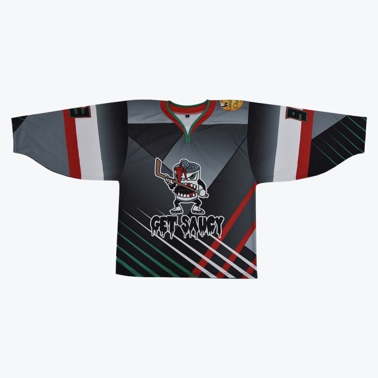 A black and grey hockey jersey with red, white, and green accents, featuring an angry cartoon can mascot holding a hockey stick and the words GET SAUCY below it.