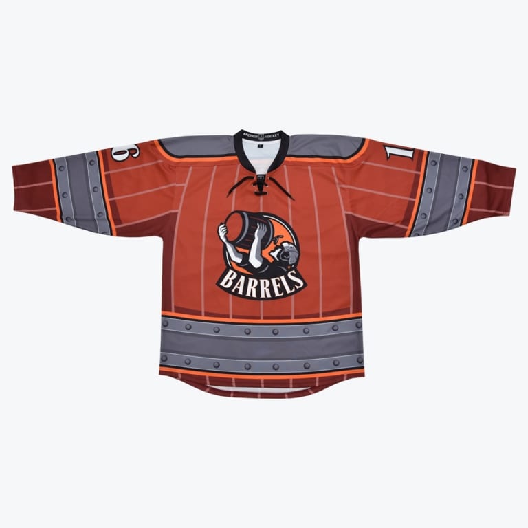 A custom reddish-brown hockey jersey designed to look like a wooden barrel, featuring a central Barrels logo, vertical stave lines, and grey riveted hoop bands on the hem and sleeves.