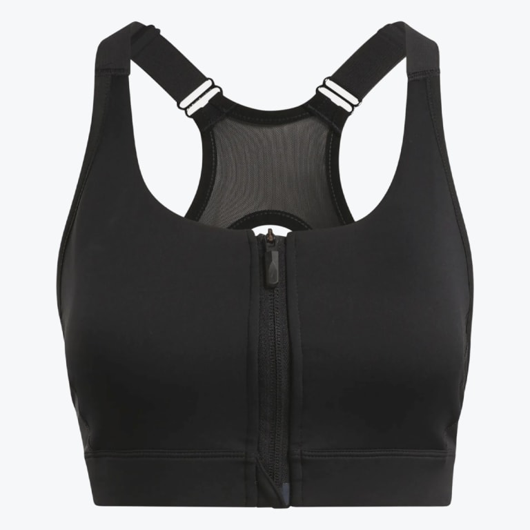 Front view of a black sports bra with a front zipper, adjustable straps, and a mesh racerback panel on a white background.