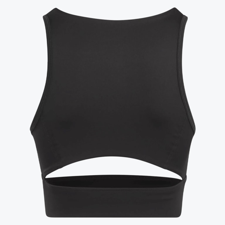 Front view of a black sleeveless crop top with a high neck and a horizontal cutout above the hem, set against a plain white background.