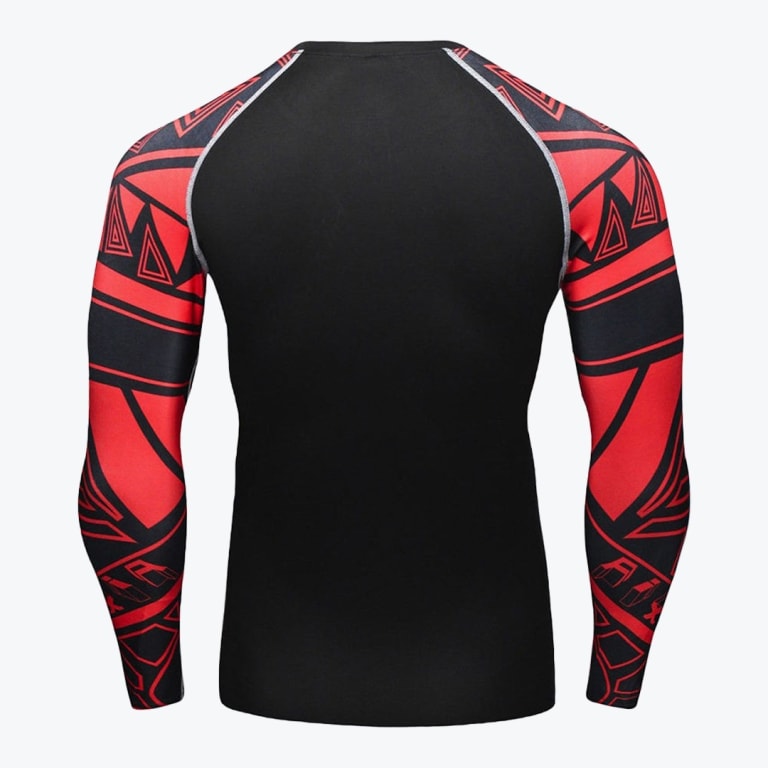 Back view of a black long-sleeved compression shirt with red and black geometric tribal patterns on the sleeves, set against a plain white background.
