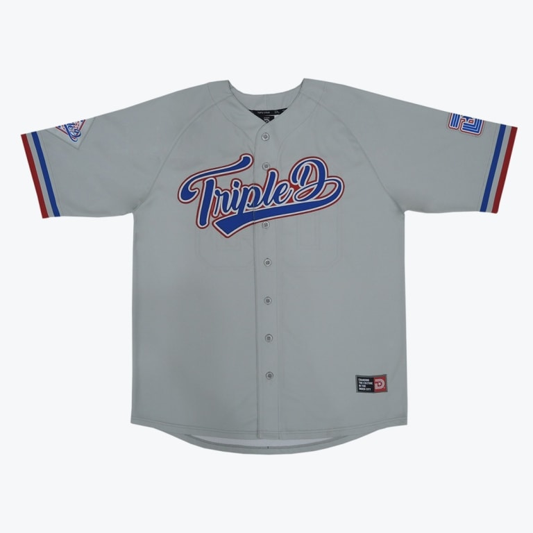 A light grey baseball jersey with Triple D written in blue and red script across the front.