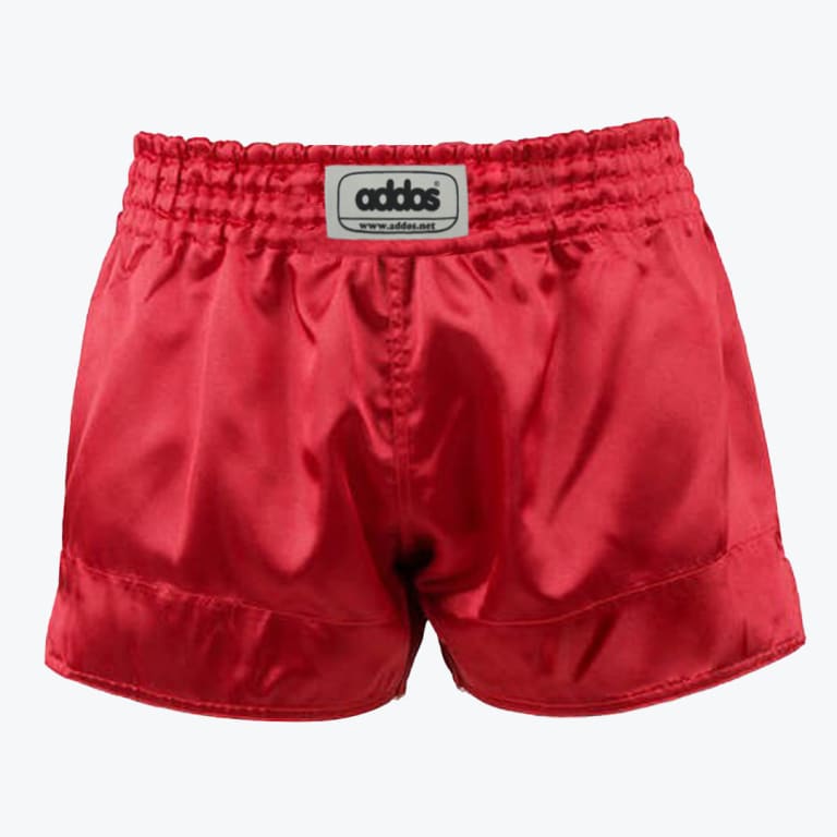 A pair of shiny red satin boxing shorts with a thick elastic waistband and a grey Addos brand patch in the center, set against a plain white background.