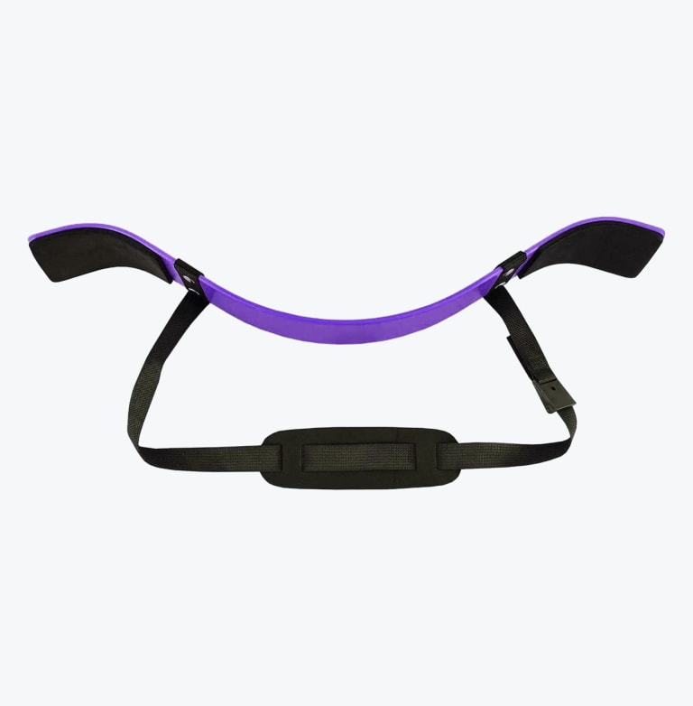 A purple metal arm blaster with black padded elbow rests and an adjustable black neck strap, isolated on a white background.