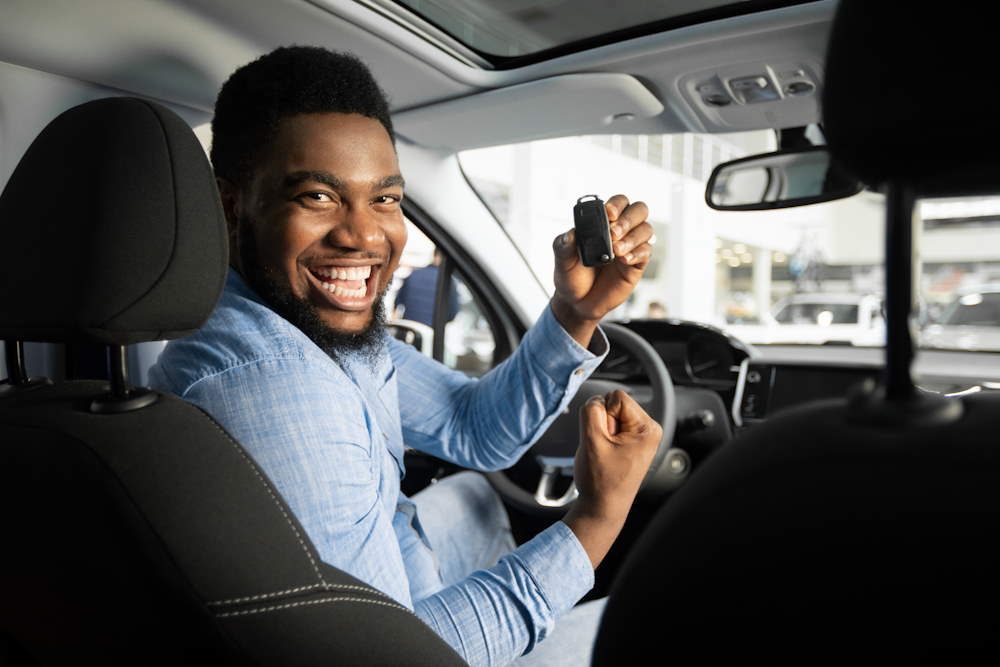 Car leasing client holding keys