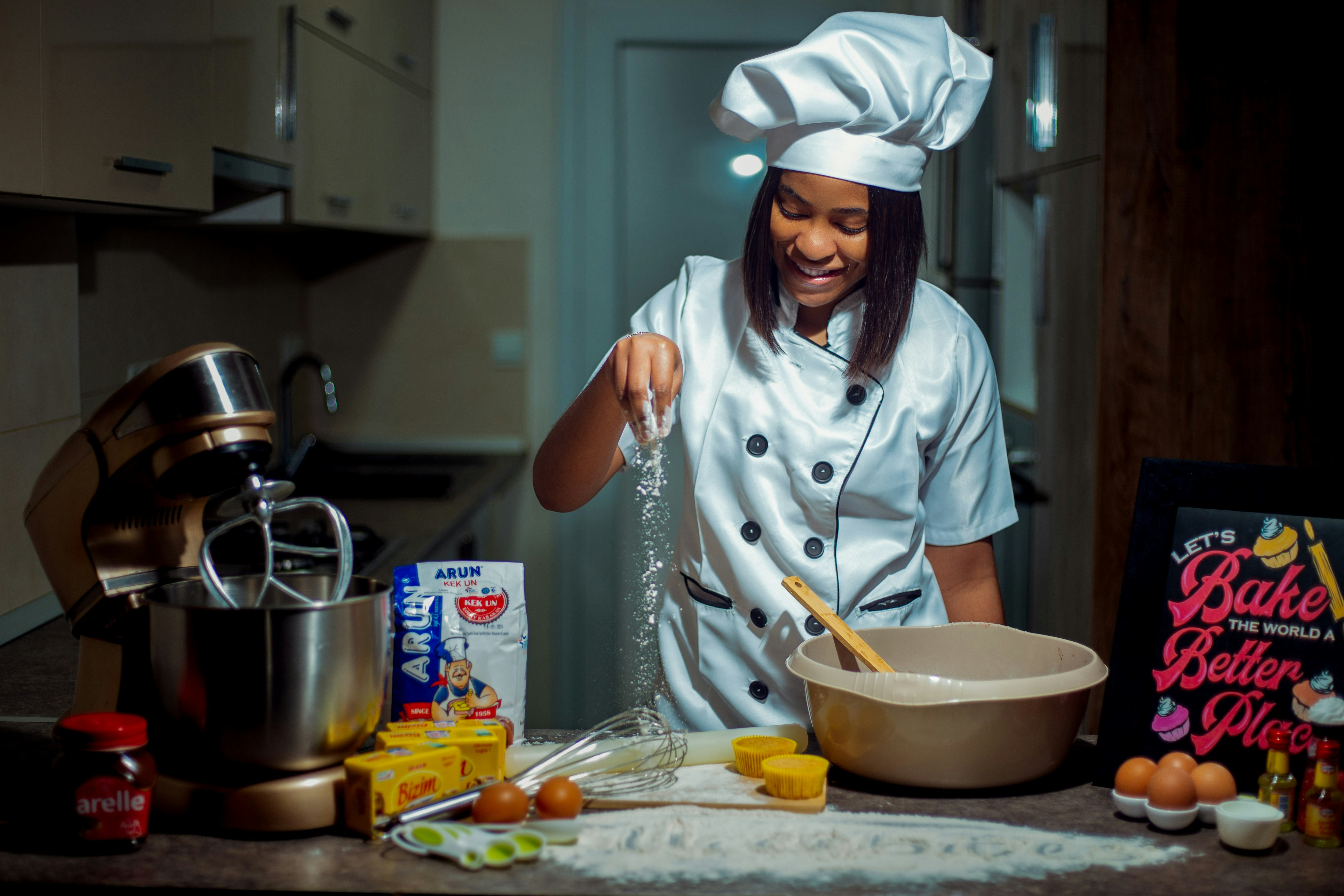 young black woman baking in home kitchen