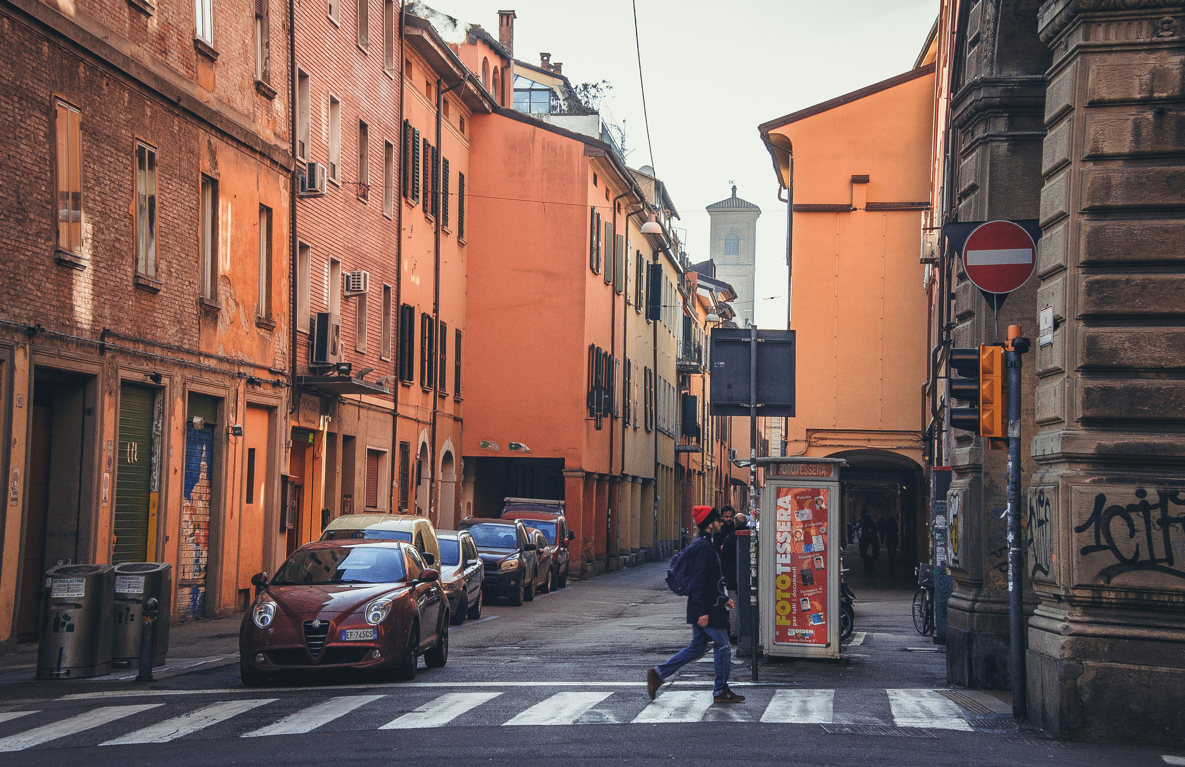 various vehicles parked on an Italian street