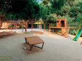 Thumbnail: Quintal de Casa, recreation area with ping-pong table and playground